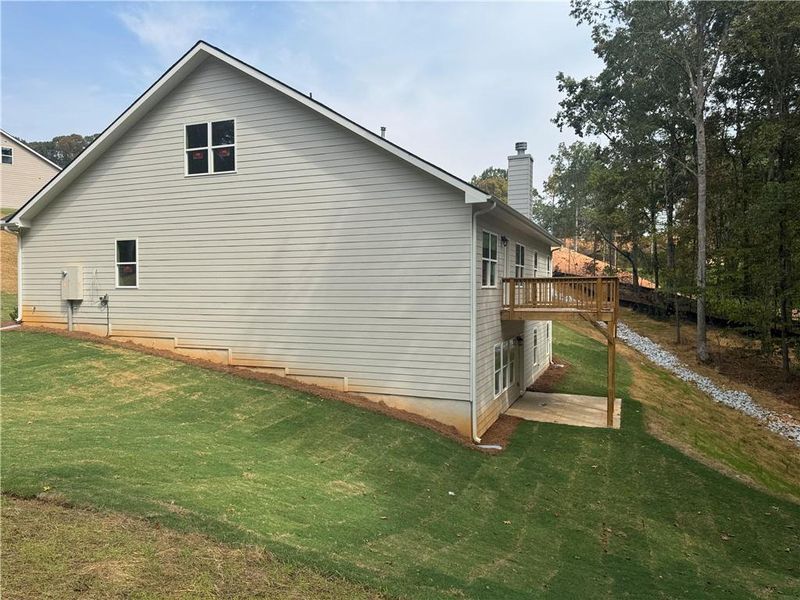 Exterior details and patio area of a home in Tuscany Hills, Douglasville (Image 27).