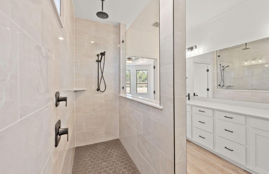 Furnished interior view inside a new home in West Cypress Hills, Spicewood (Image 9).