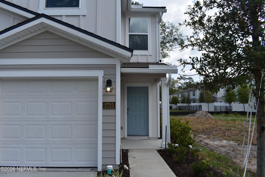 Exterior details and patio area of a home in Irongate Villas, Jacksonville (Image 2).