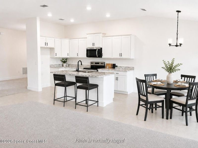 Furnished interior view inside a new home in St. John's Preserve, Palm Bay (Image 7).