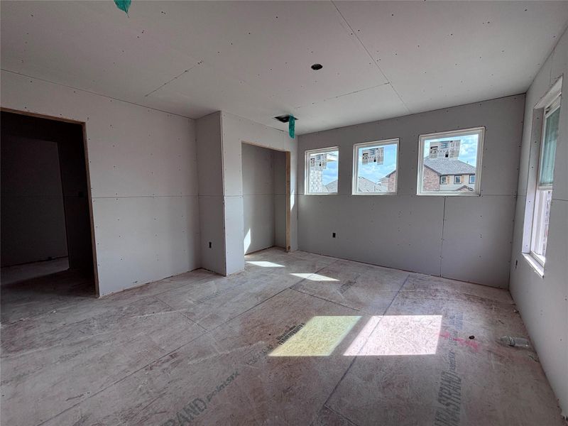 In-progress construction of a new home in The Colony, Bastrop, TX (Image 28).