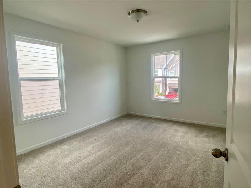 Spacious, unfurnished interior of a new home in Eastlyn Crossing, Flowery Branch (Image 26). Spacious, unfurnished interior of a new home in Eastlyn Crossing, Flowery Branch (Image 26).