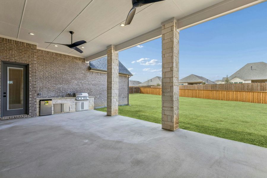 Exterior details and patio area of a home in The Vines, Haslet (Image 4).