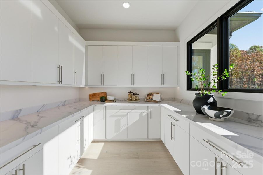 Furnished interior view inside a new home in , Matthews (Image 39).