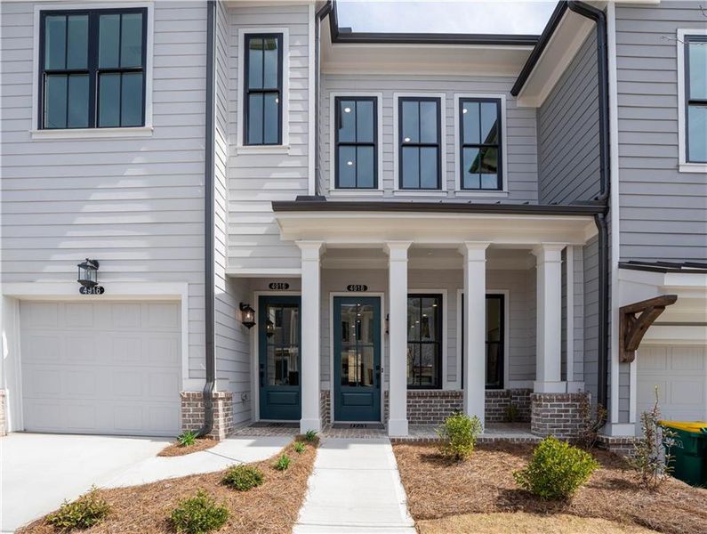 Exterior details and patio area of a home in Waterside Condos, Peachtree Corners (Image 4).