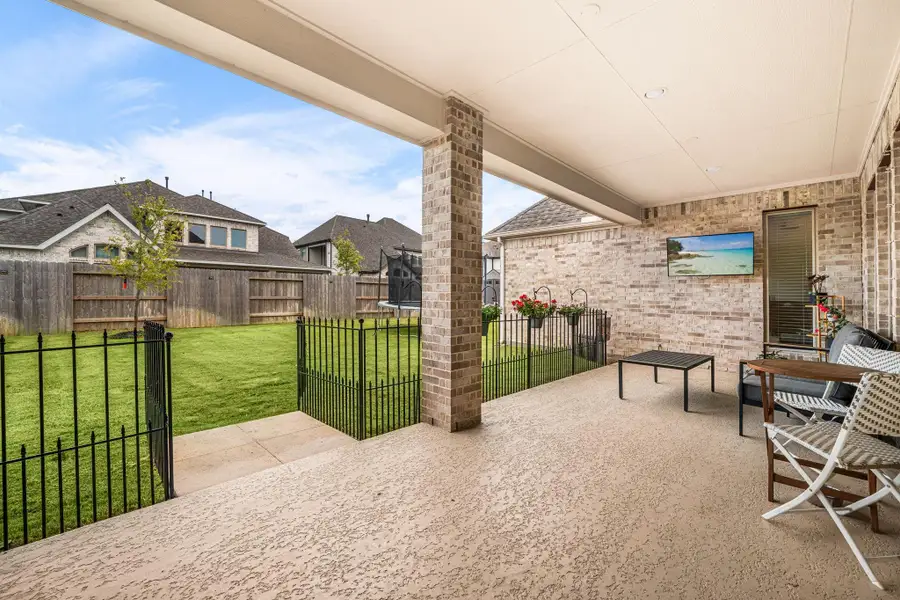 Exterior details and patio area of a home in , Manvel (Image 22).