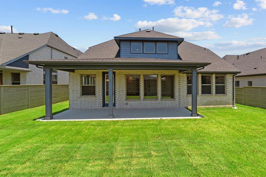 Front exterior of a new home in Treeline, Justin, TX, highlighting curb appeal (Image 2).