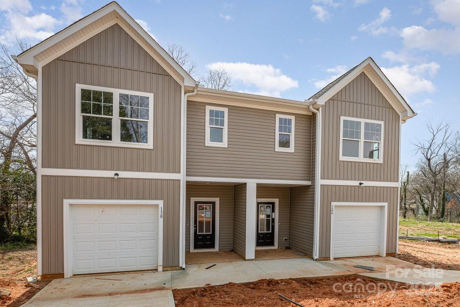Front exterior of a new home in , Statesville, NC, highlighting curb appeal (Image 2).