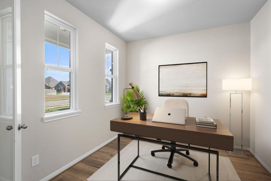 The home office features French doors, beautiful floors, large windows that give a fresh feel, this space promotes focus and creativity.