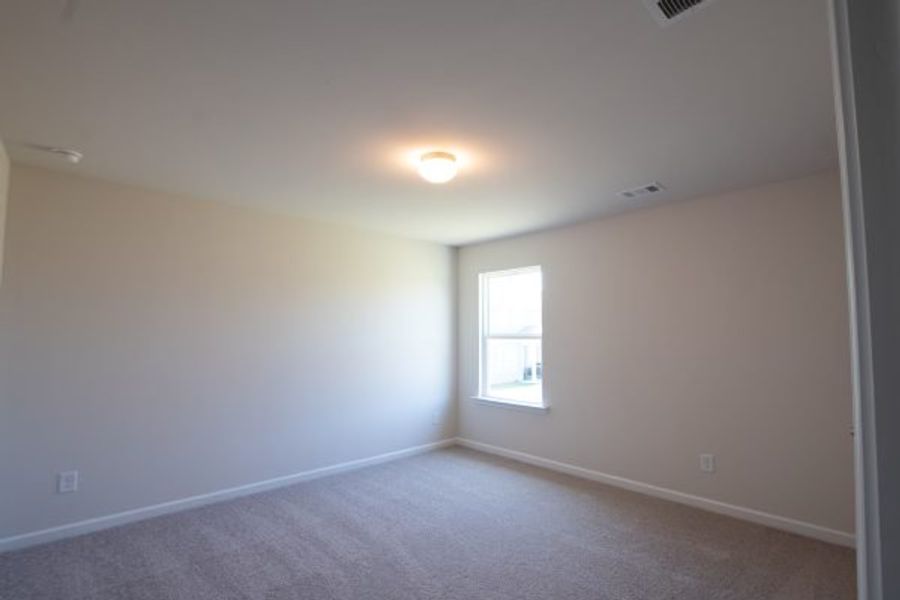 Representative unfurnished interior of a home built from the Fairfax by Piedmont Residential in Falls Creek, Flowery Branch (Image 14).