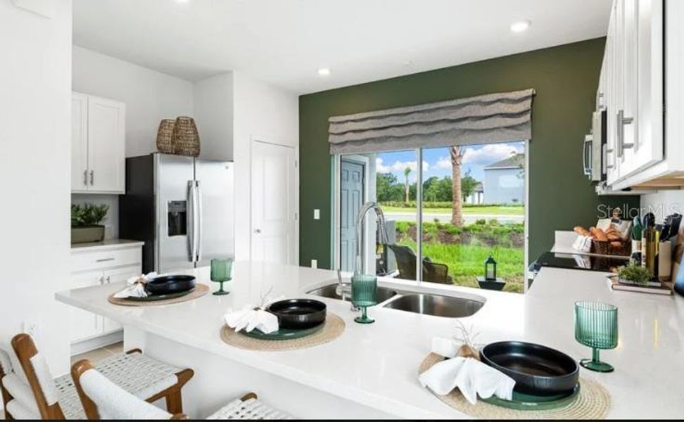 Furnished interior view inside a new home in Firethorn, Parrish (Image 11).