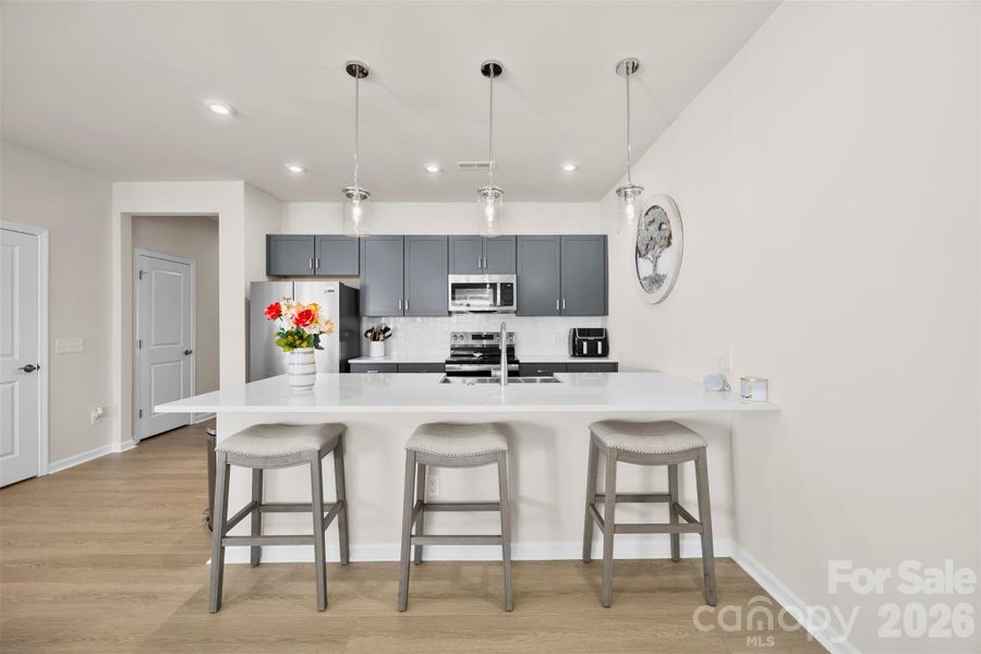 Kitchen with bar stools