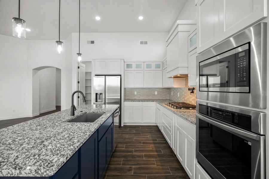 Representative furnished interior of a home built from the Scottsdale by LEH. Homes in Verdancia, El Paso (Image 12).