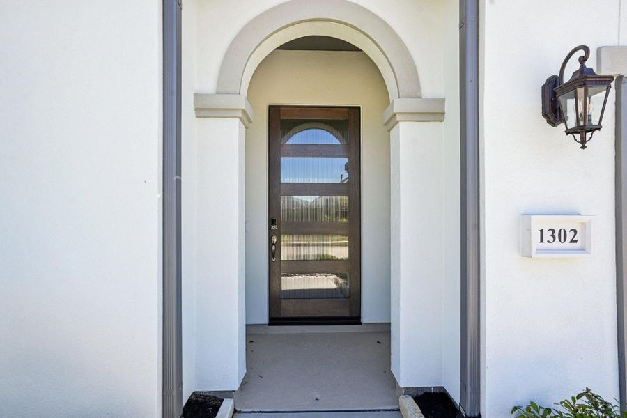 Exterior details and patio area of a home in Sienna 65', Missouri City (Image 3).