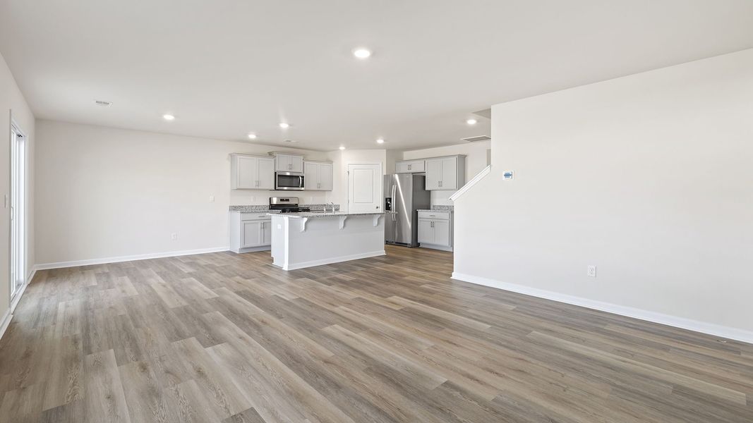 Spacious, unfurnished interior of a new home in Bentley Park, Greenwood (Image 21).