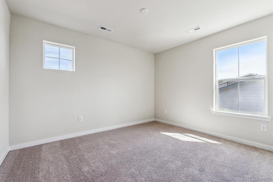 Spacious, unfurnished interior of a new home in Red Barn Meadows, Mead (Image 13).