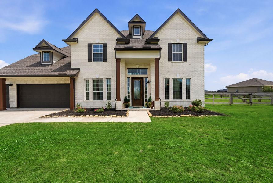 Front exterior of a new home in , Waller, TX, highlighting curb appeal (Image 24).
