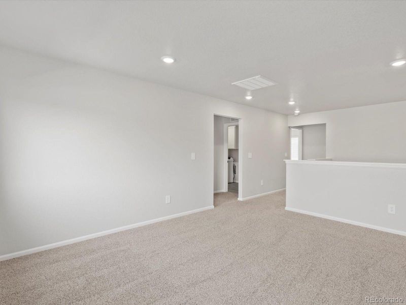 Spacious, unfurnished interior of a new home in Poudre Heights: The Lakes Collection, Windsor (Image 13).