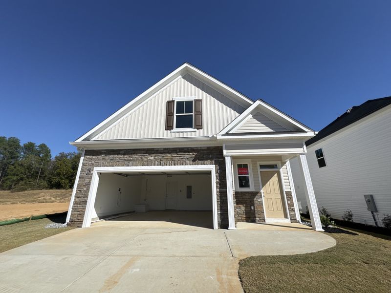 Front exterior of a new home in Windsor, North Augusta, SC, highlighting curb appeal (Image 1). Front exterior of a new home in Windsor, North Augusta, SC, highlighting curb appeal (Image 1).