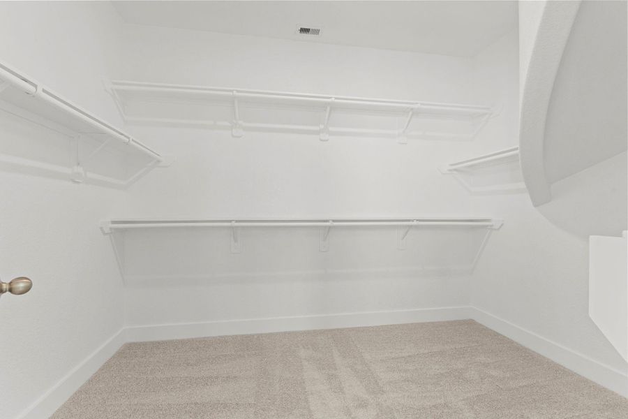 The spacious walk-in closet offers exceptional storage with multiple hanging sections, open shelving, and abundant room for organization. It’s the perfect balance of practicality and style—every fashion lover’s dream space. The spacious walk-in closet offers exceptional storage with multiple hanging sections, open shelving, and abundant room for organization. It’s the perfect balance of practicality and style—every fashion lover’s dream space.
