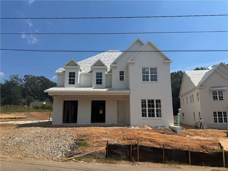 Front exterior of a new home in , Suwanee, GA, highlighting curb appeal (Image 13). Front exterior of a new home in , Suwanee, GA, highlighting curb appeal (Image 13).
