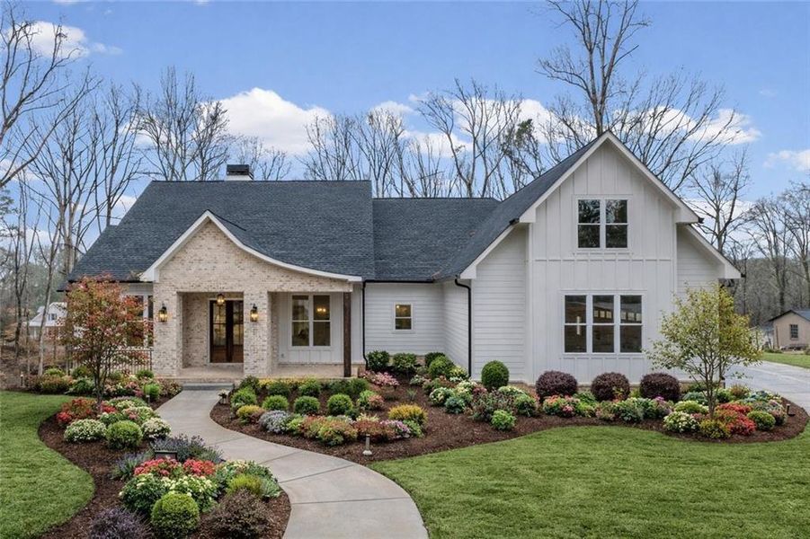 Front exterior of a new home in , Canton, GA, highlighting curb appeal (Image 31).