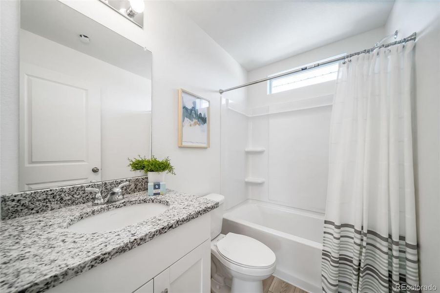 Furnished interior view inside a new home in Reunion, Commerce City (Image 14).