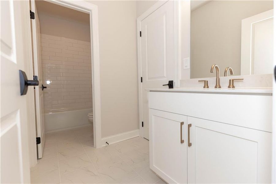 Furnished interior view inside a new home in Evanshire Single Family, Duluth (Image 11).