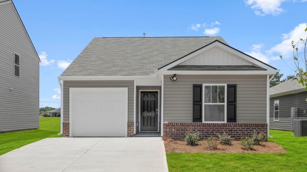 Front exterior of a new home in Harper Ridge, Roebuck, SC, highlighting curb appeal (Image 1). Front exterior of a new home in Harper Ridge, Roebuck, SC, highlighting curb appeal (Image 1).
