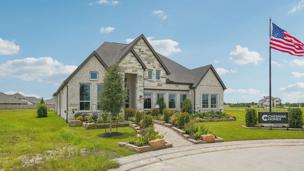 Representative exterior photo of a completed home built from the Sydney by Chesmar Homes in Westland Ranch, League City, TX (Image 23).