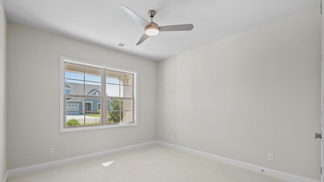 Spacious, unfurnished interior of a new home in Courtyards by Carrell, Ocean Isle Beach (Image 18). Spacious, unfurnished interior of a new home in Courtyards by Carrell, Ocean Isle Beach (Image 18).