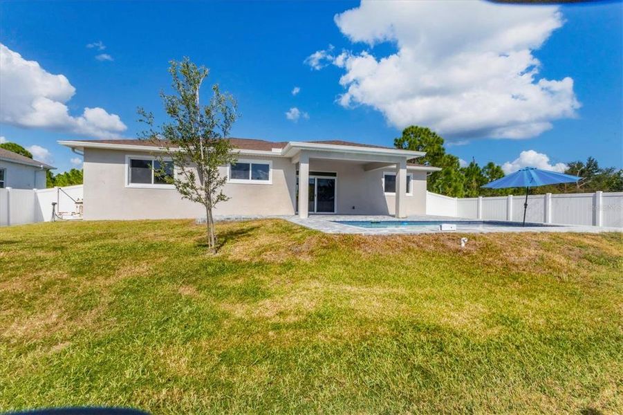Exterior details and patio area of a home in , Port Charlotte (Image 18). Exterior details and patio area of a home in , Port Charlotte (Image 18).
