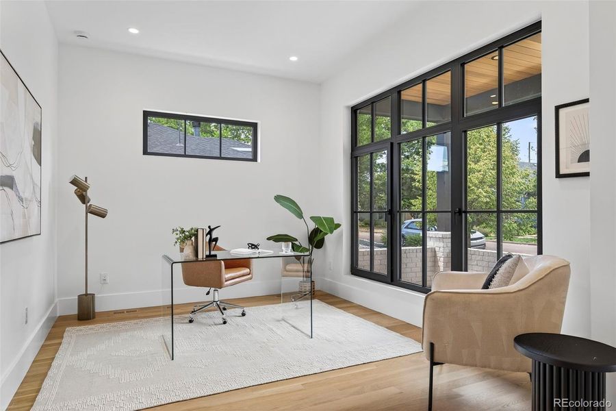 Main floor office at front of home, this build will have French doors