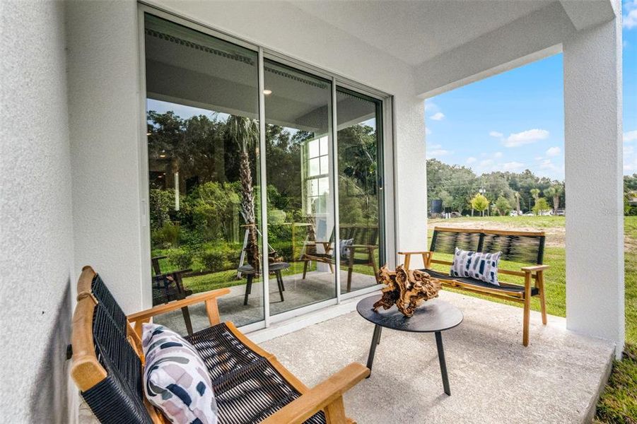 Exterior details and patio area of a home in Delaney Reserve, Deland (Image 23).