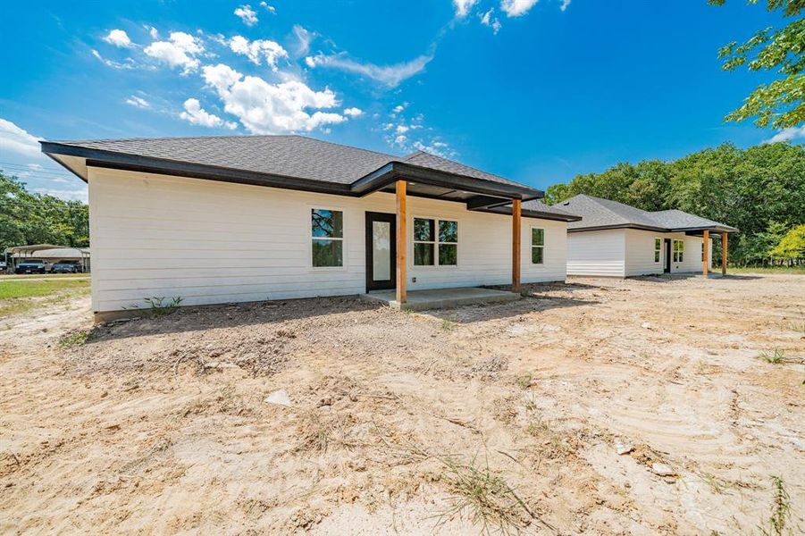 Front exterior of a new home in , Malakoff, TX, highlighting curb appeal (Image 21).