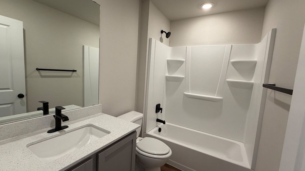 Furnished interior view inside a new home in The Lakes Northwest, Corpus Christi (Image 9).