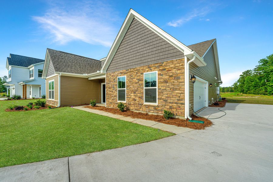 Representative exterior photo of a completed home built from the Mercer by Center Park Homes in Central Estates, Summerville, SC (Image 2). Representative exterior photo of a completed home built from the Mercer by Center Park Homes in Central Estates, Summerville, SC (Image 2).