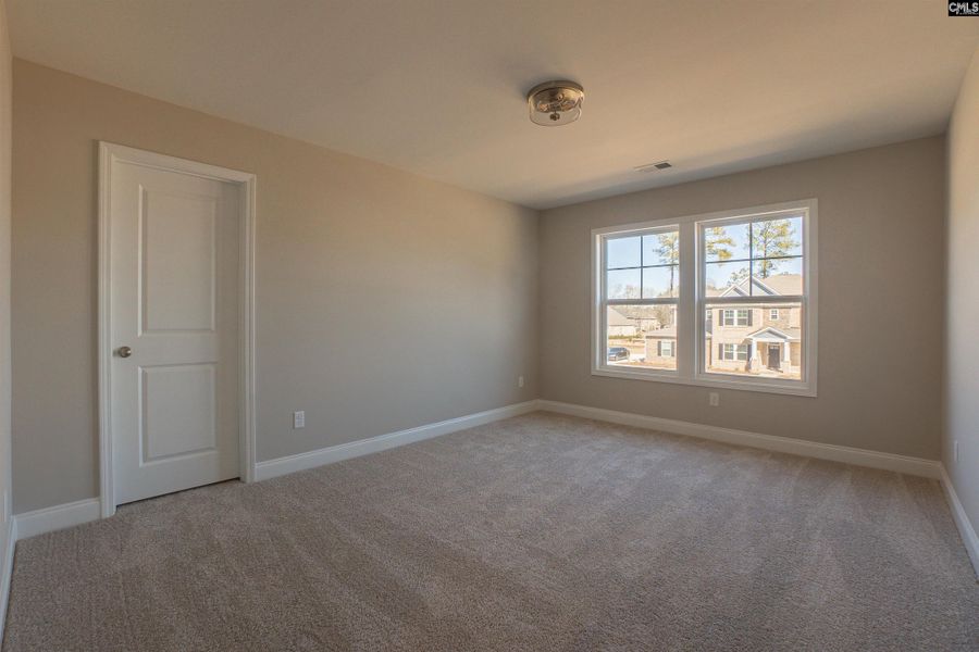 Spacious, unfurnished interior of a new home in The Cove, Sumter (Image 45).