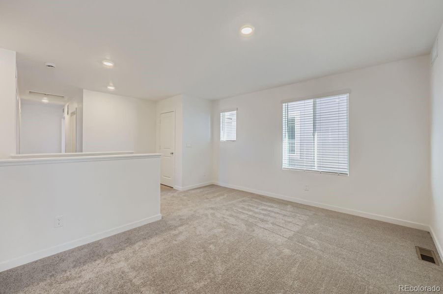 Spacious, unfurnished interior of a new home in Copper Chase: The Celestial Collection, Colorado Springs (Image 12).