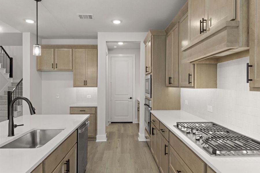 Furnished interior view inside a new home in Inspiration Collection at Union Park, Little Elm (Image 5).