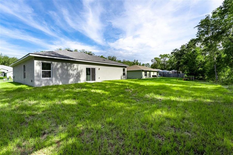 Front exterior of a new home in , Citrus Springs, FL, highlighting curb appeal (Image 7). Front exterior of a new home in , Citrus Springs, FL, highlighting curb appeal (Image 7).