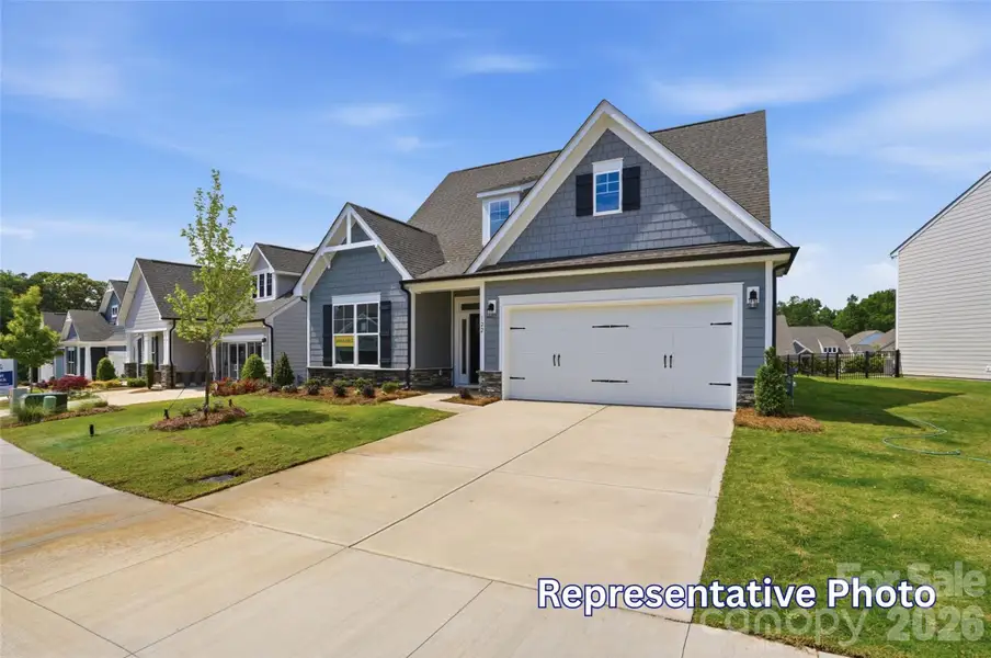 Front exterior of a new home in Enclave at Riverdale, Huntersville, NC, highlighting curb appeal (Image 23).
