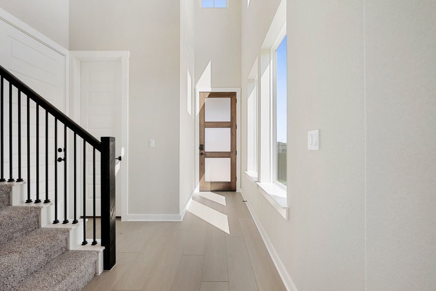 Spacious, unfurnished interior of a new home in Terrace Collection At Turner's Crossing, Buda (Image 20).