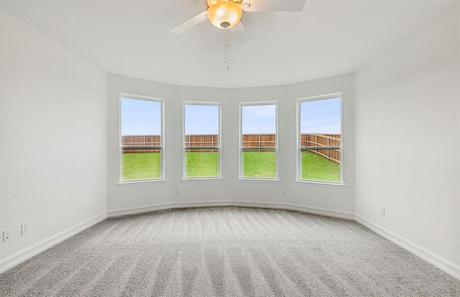 Elegant owner's suite with Bay window *real home pictured