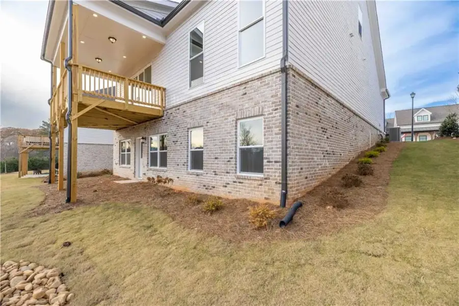 Exterior details and patio area of a home in Aberdeen, Hoschton (Image 44).