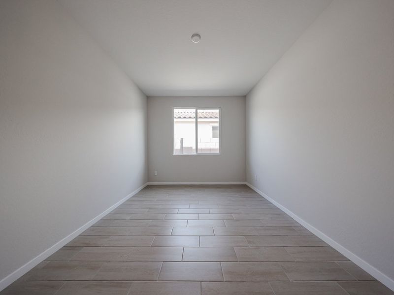 A room with a window. A room with a window.