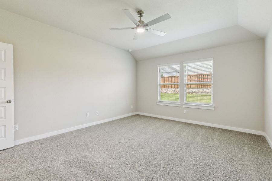 Primary Suite in the Heisman home plan by Trophy Signature Homes – REPRESENTATIVE PHOTO Primary Suite in the Heisman home plan by Trophy Signature Homes – REPRESENTATIVE PHOTO