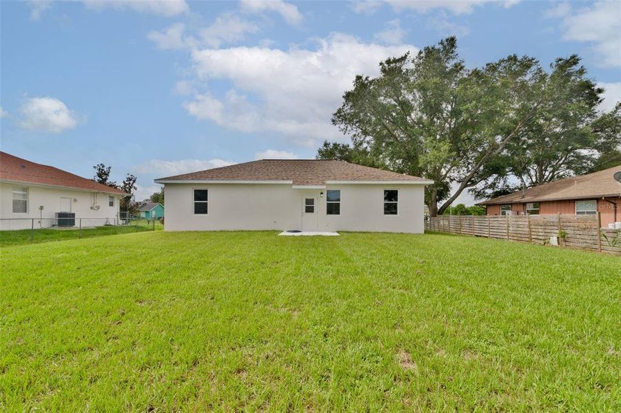 Exterior details and patio area of a home in , North Port (Image 23).
