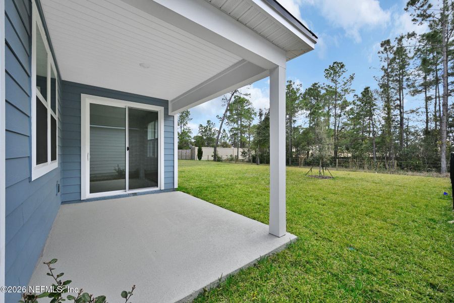 Exterior details and patio area of a home in Hyland Trail, Green Cove Springs (Image 24).