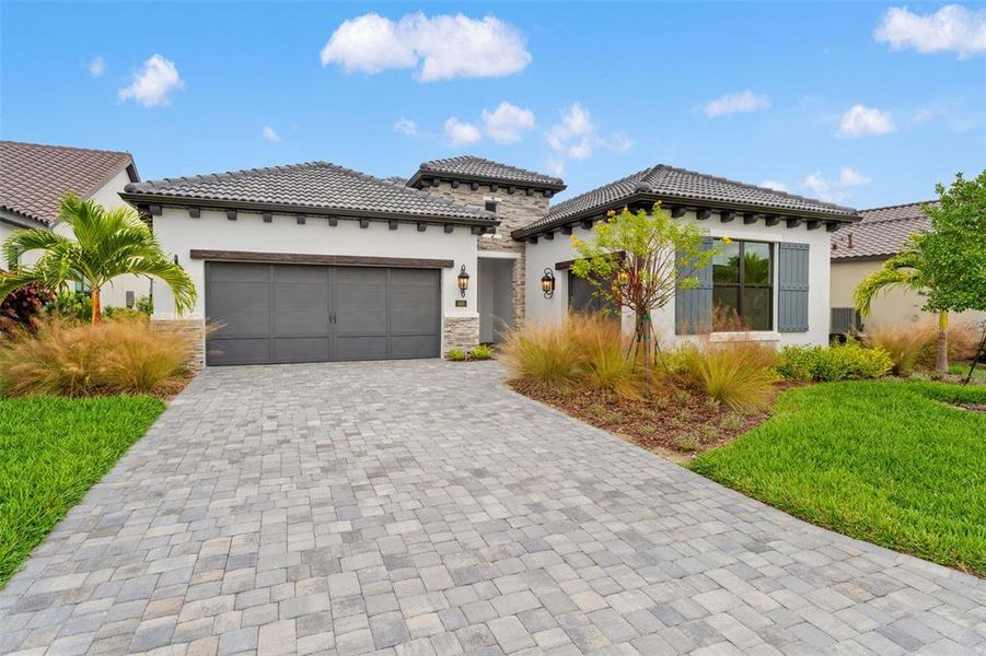 Front exterior of a new home in , Nokomis, FL, highlighting curb appeal (Image 28). Front exterior of a new home in , Nokomis, FL, highlighting curb appeal (Image 28).